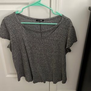 grey tee shirt from fashion nova. cute small opening around chest.